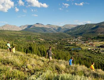 Group hiking down a hill.