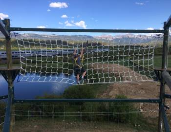 Man on cargo net.