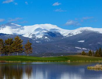 Pole Creek Golf Course and Rocky Mountains.
