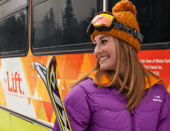 Woman getting on the Lift bus.